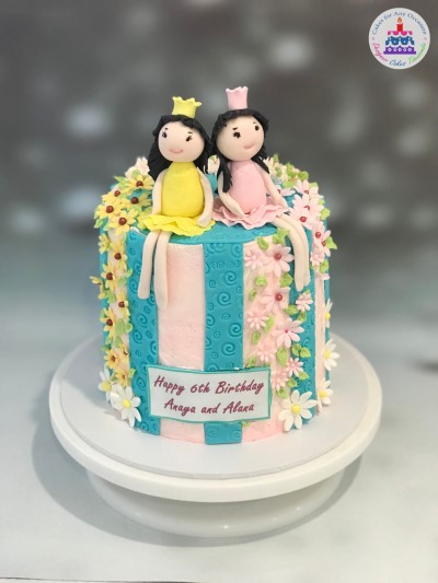Twin Sisters Toppers Cake.jpg
